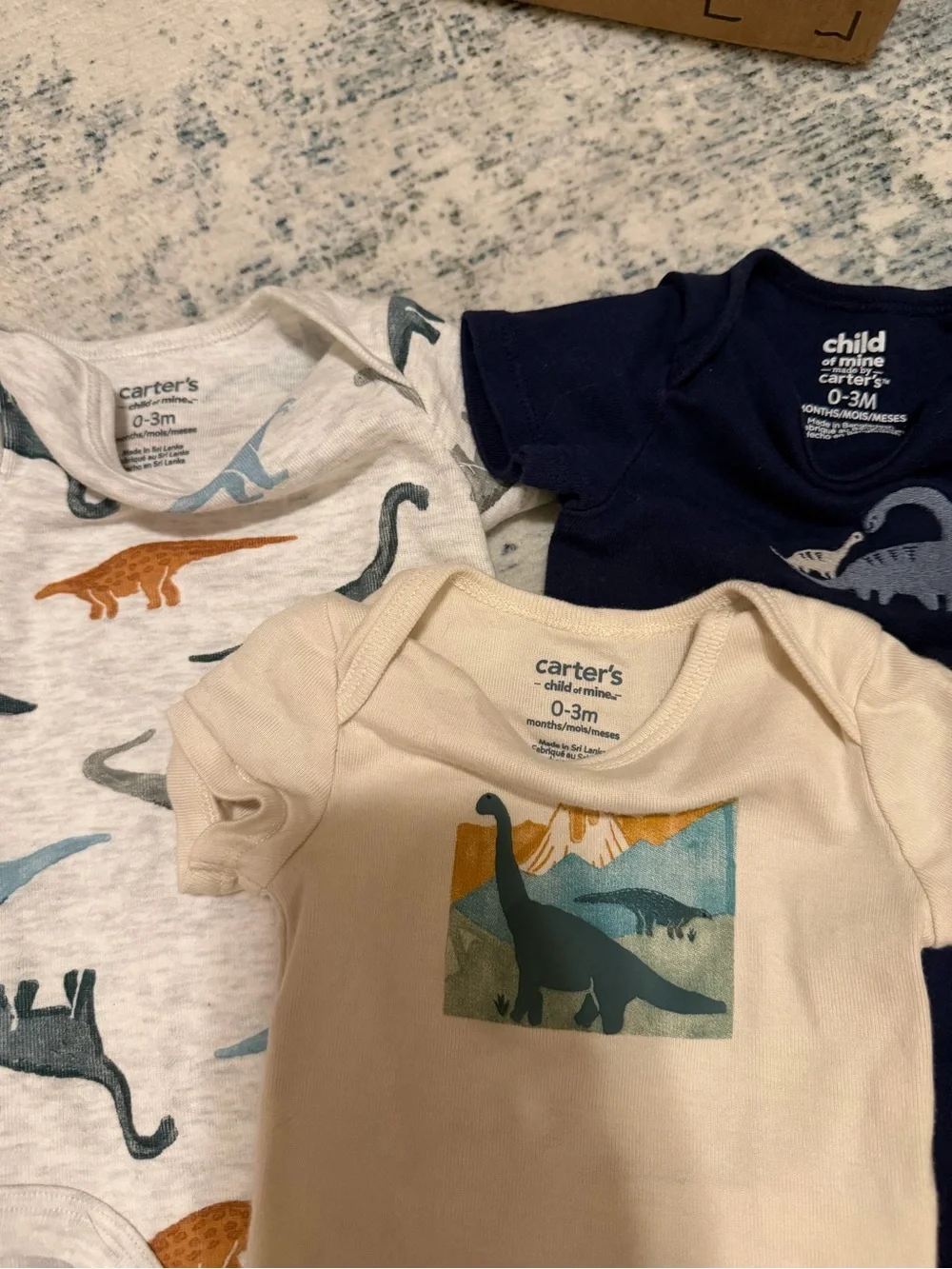 Carter's 3-Pack Dinosaur Bodysuits in Navy, Cream & Heather Light Gray